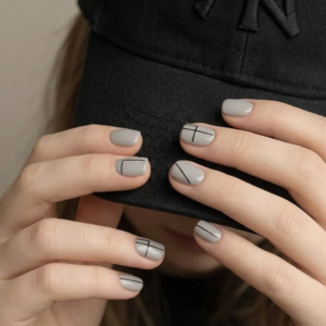 minimalist gray short nails with modern everyday aesthetic and subtle line art