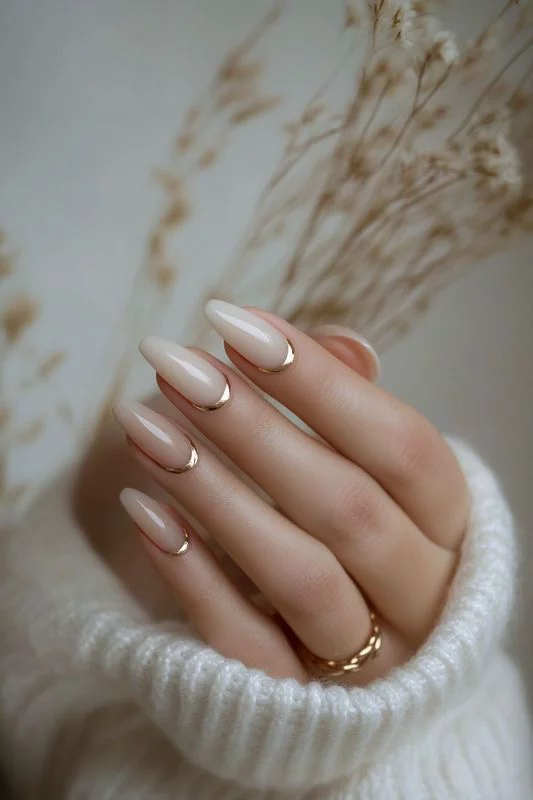 reverse french metallic gold cuff nail art milky white