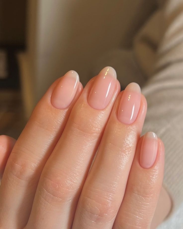 Clean short nails with a sheer glossy finish, simple summer nails ideas for a minimal clean girl look.