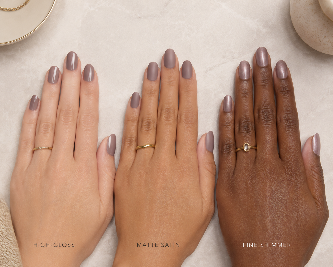 Glossy, satin, and shimmer finish comparison on the same monochrome nail polish shade.