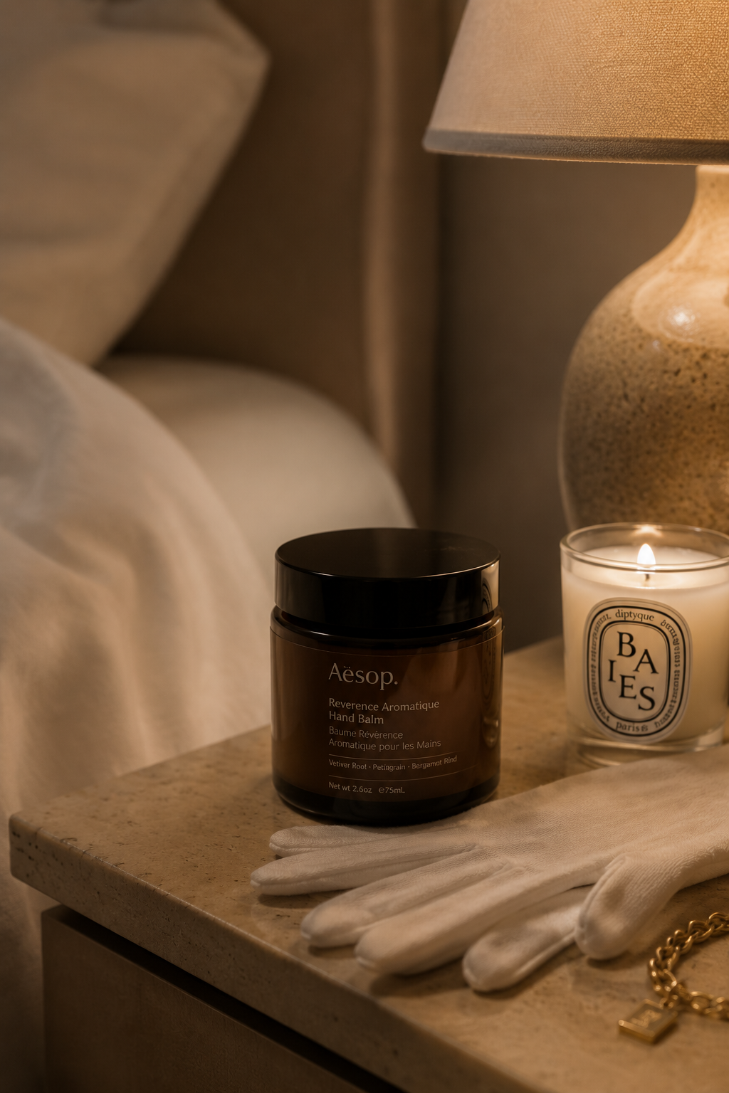 Overnight hand cream ritual with cotton gloves for deep repair of dry, aging hands.