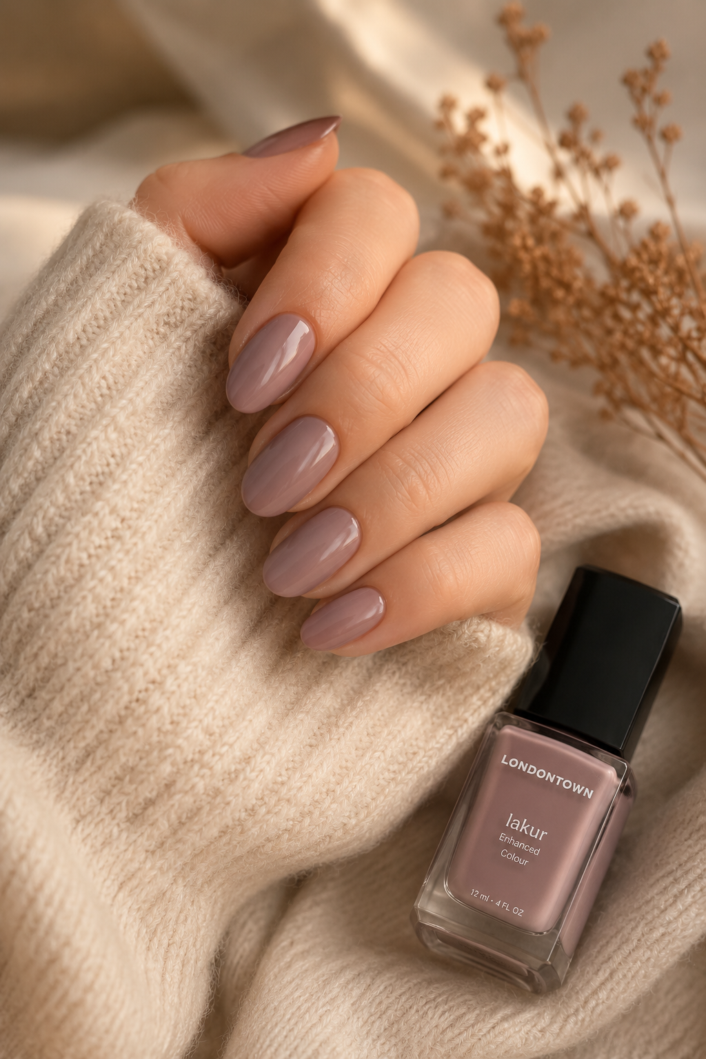 Milky mauve nail polish shade styled for a soft feminine fall manicure