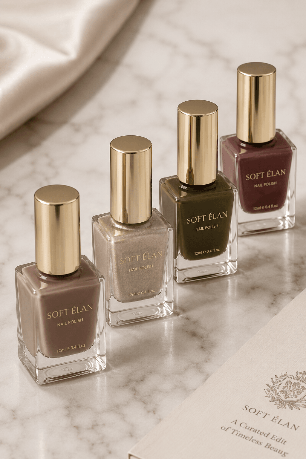 Subtle chrome nail polish shades including taupe, champagne, olive, and burgundy
